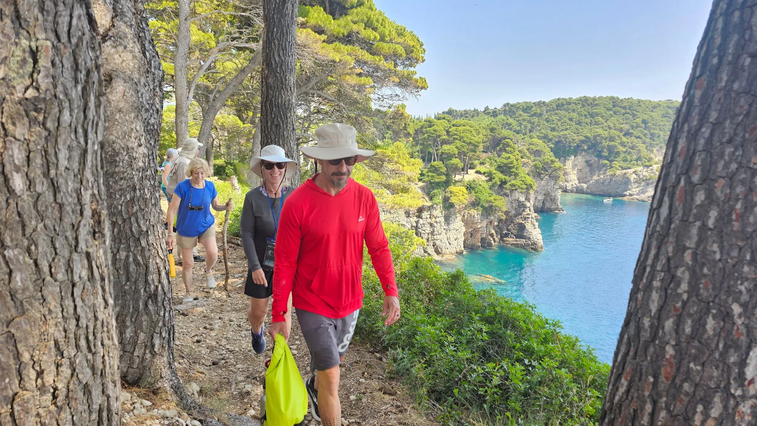 Kayakers crossing open water between islands