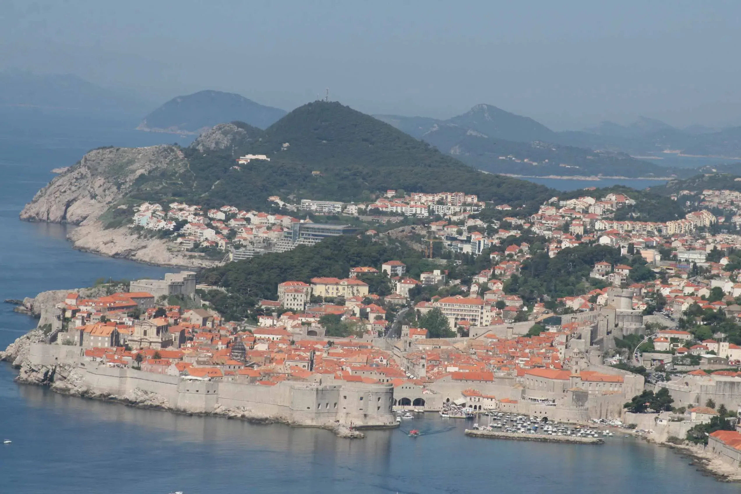 Aerial view of Dubrovnik old town on its peninsula with islands beyond